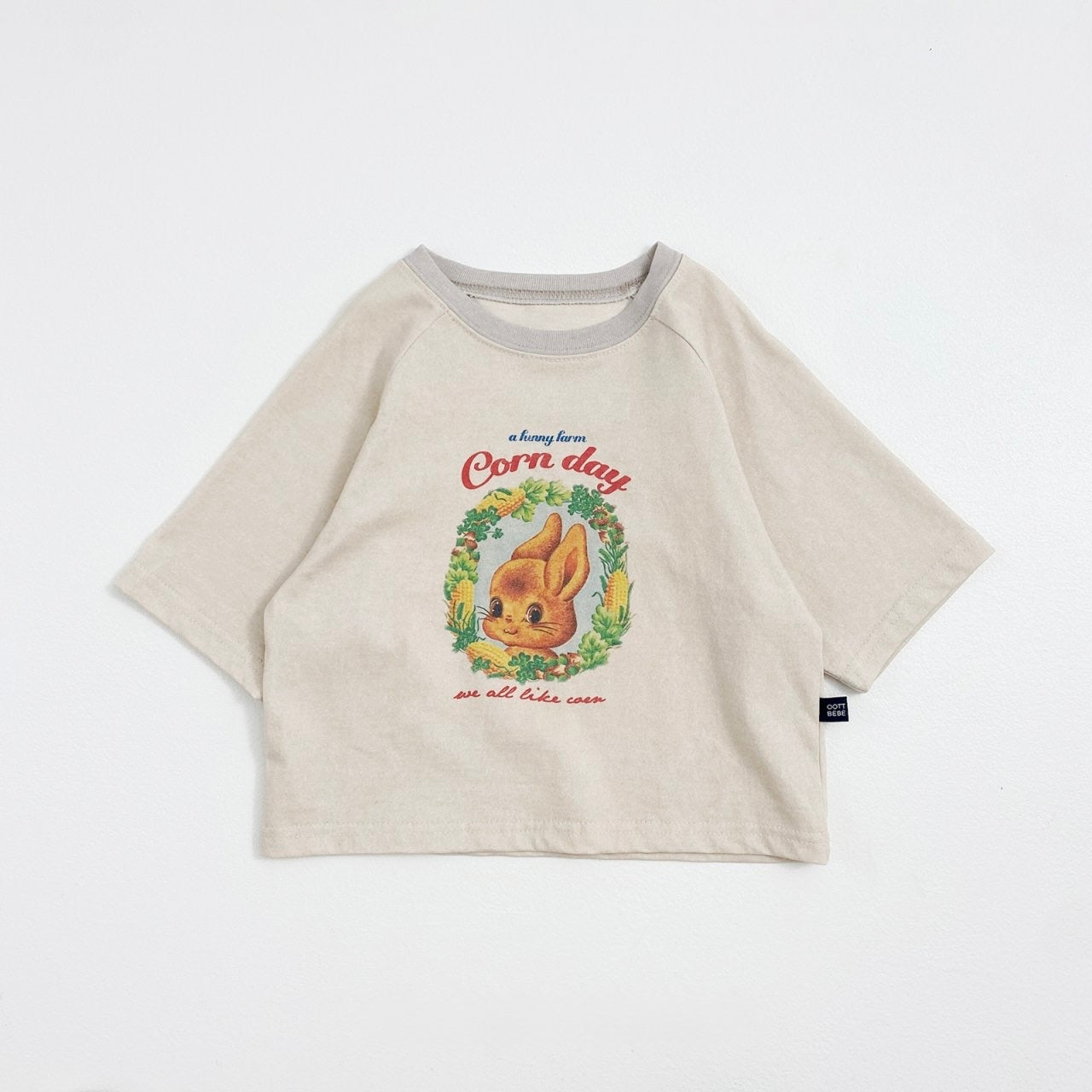 Beige t-shirt with a graphic of a rabbit for toddlers