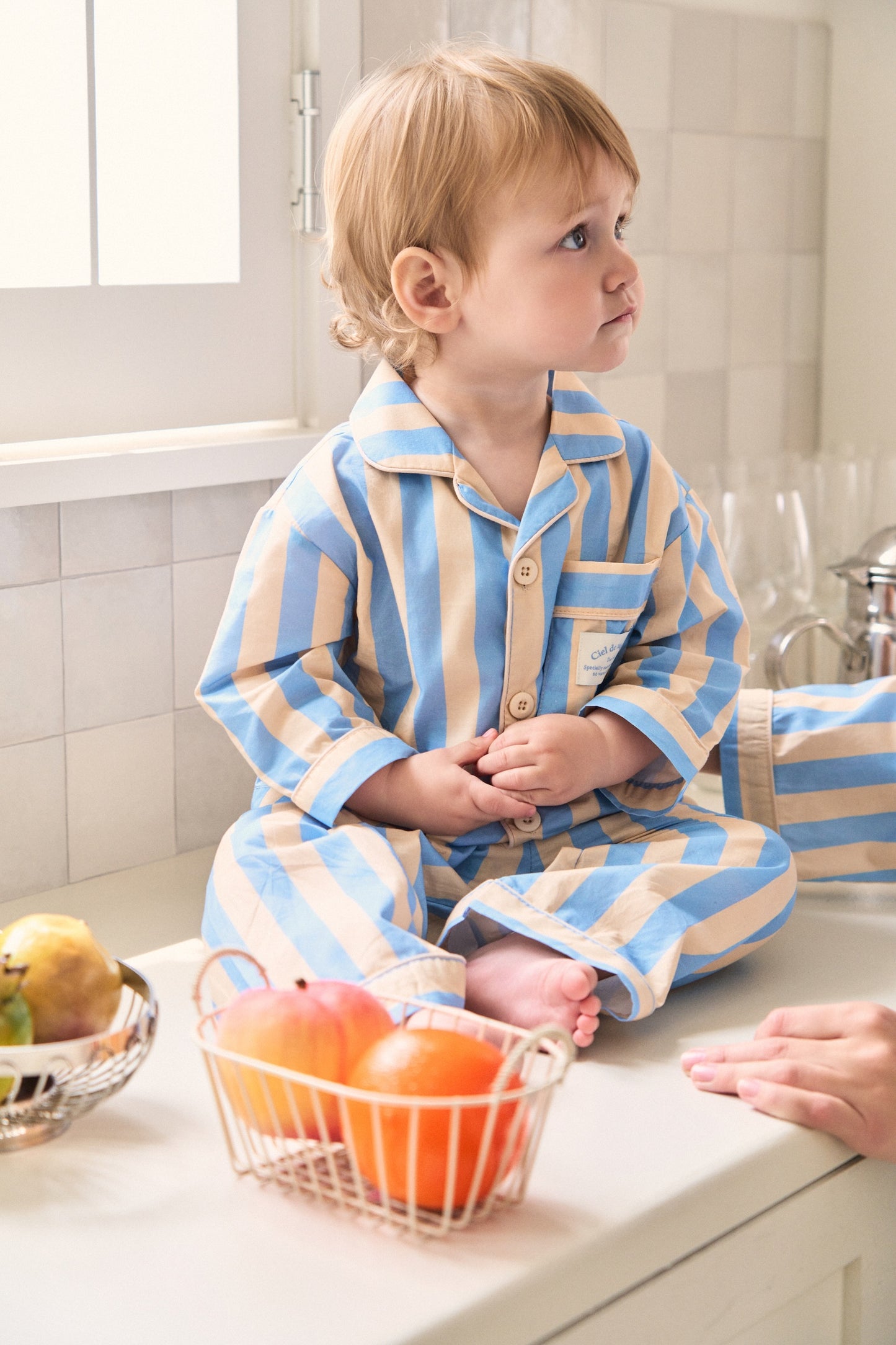 Comfy pajama set styled as mom and son matching outfits in muted blue tones