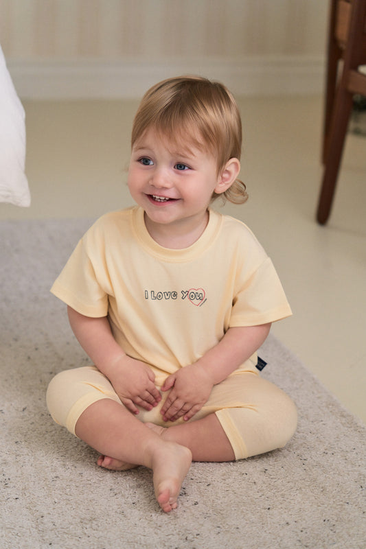 Baby boy in cute toddler boy clothes