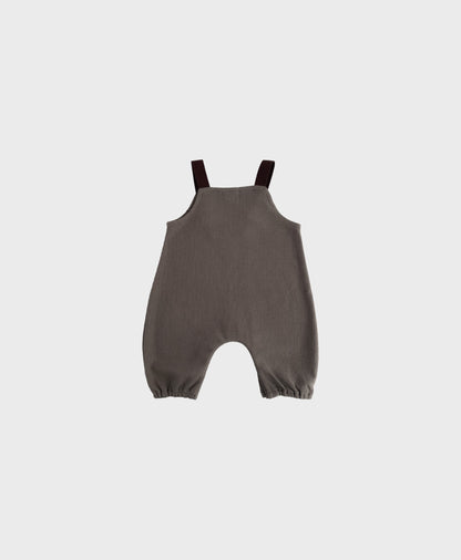Stylish hip baby boy clothing: Brown sleeveless overall with brown straps.