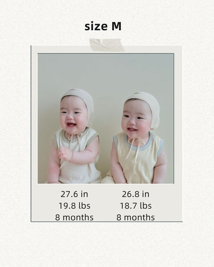 Toddler and baby wearing matching outfits twin model sizes