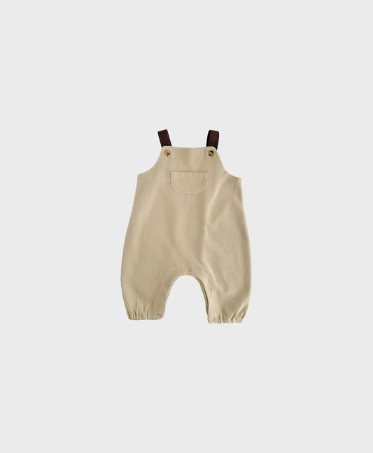 Beige sleeveless overall with brown straps for hip baby boy with snap buttons.