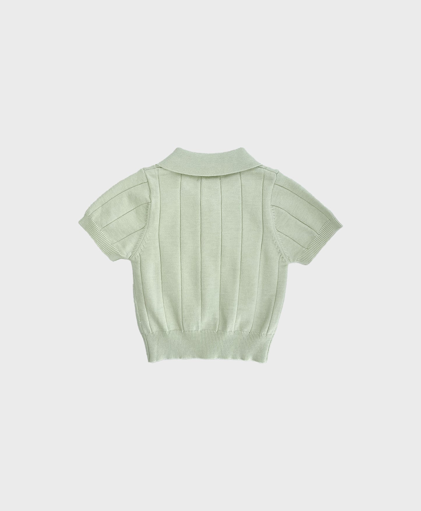 Baby sweater polo in pastel green, featuring a collar. A stylish choice for formal baby boy clothes.