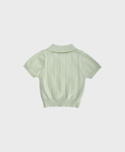 Baby sweater polo in pastel green, featuring a collar. A stylish choice for formal baby boy clothes.