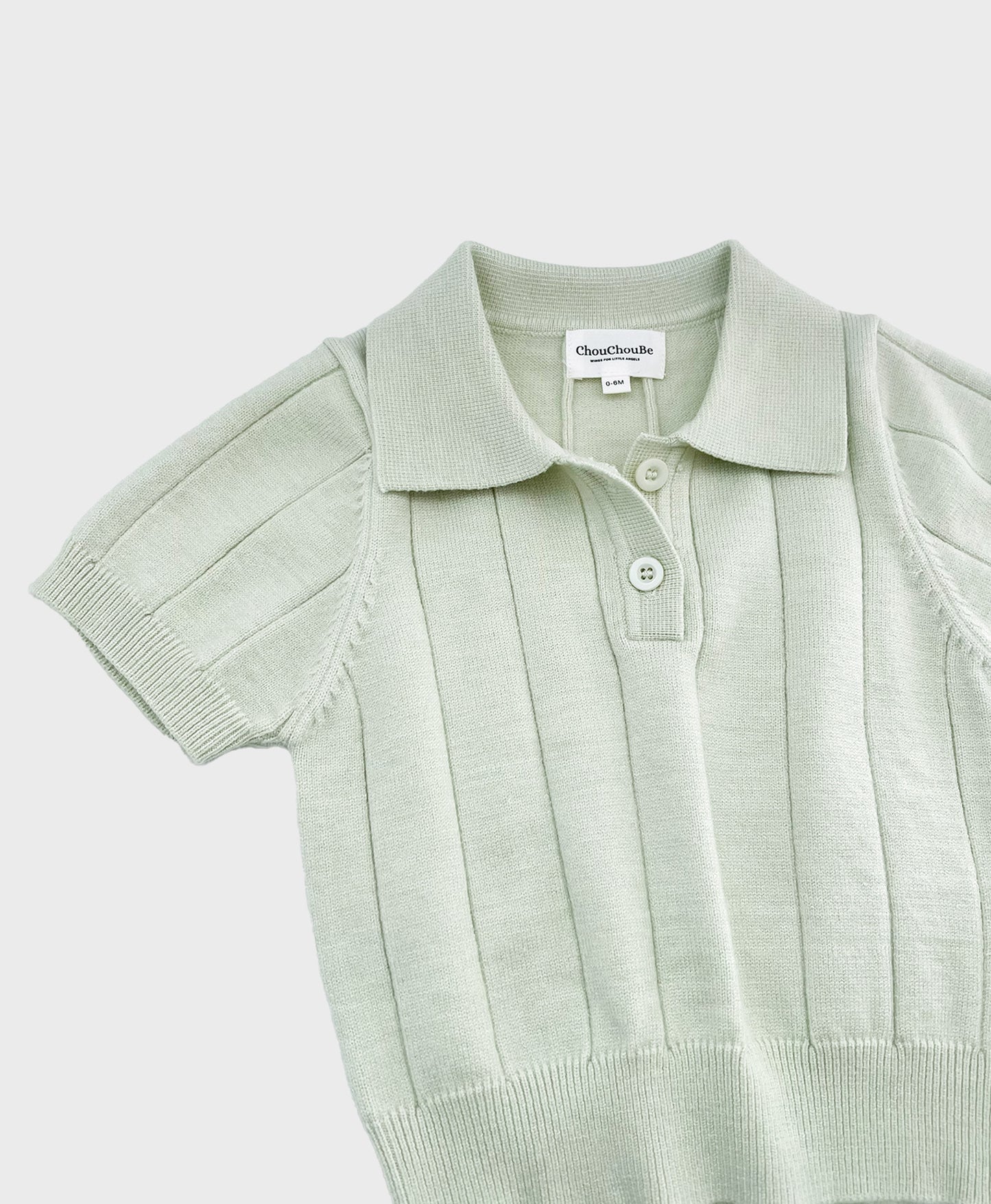 Baby boy dedication clothes: a stylish pastel green polo shirt with a collar, made of soft knit material