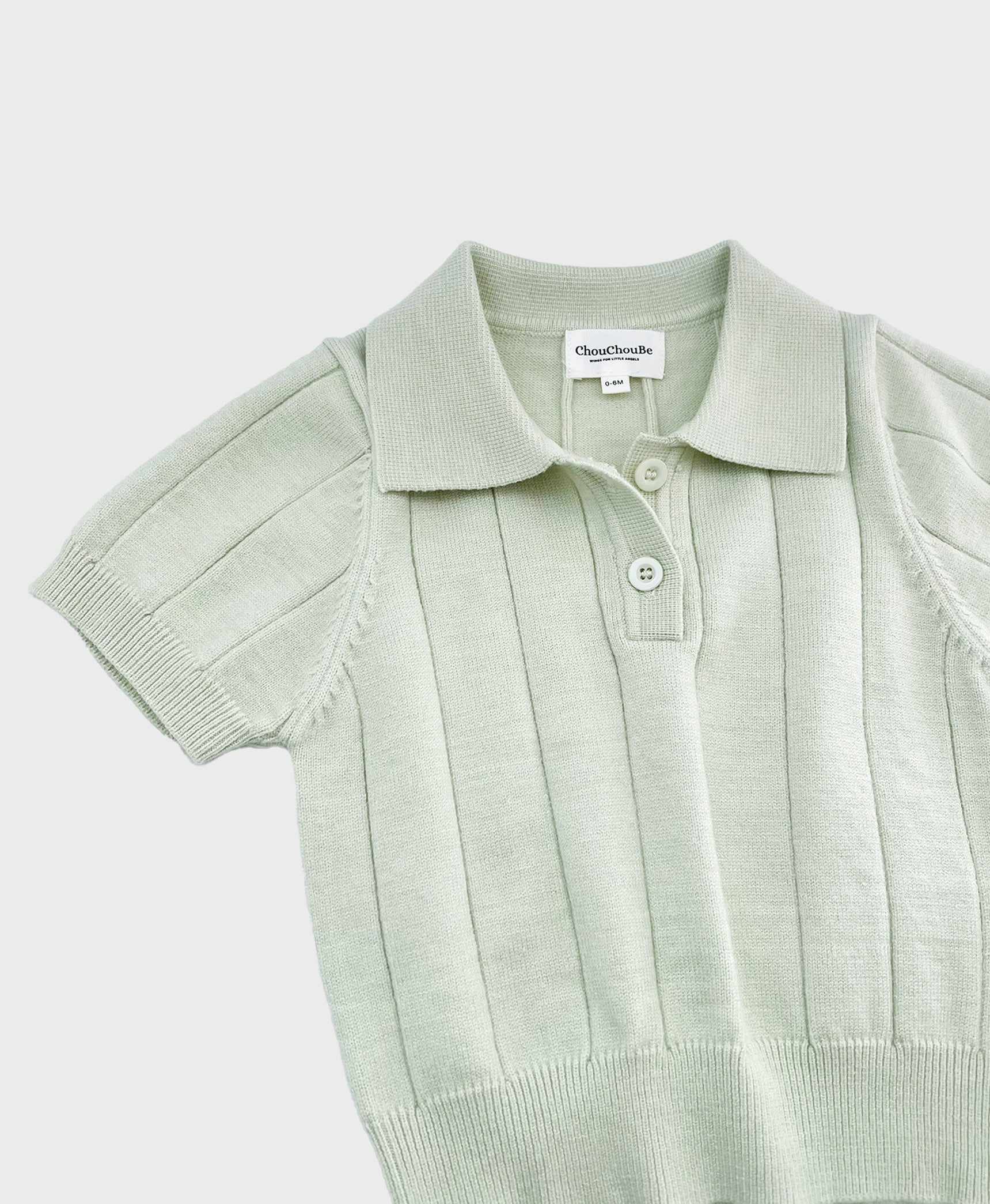 Baby boy dedication clothes: a stylish pastel green polo shirt with a collar, made of soft knit material