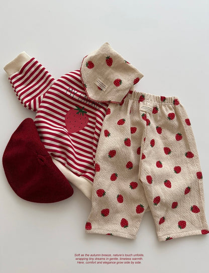 Baby and toddler outfit with red and white striped shirt, red hat, and beige pants with strawberry pattern