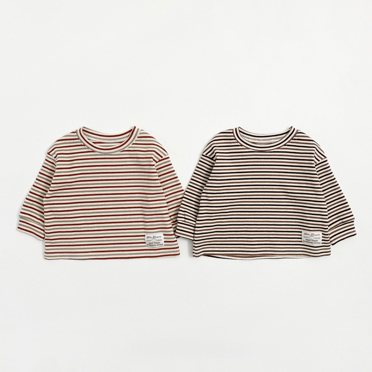 Two striped long-sleeve shirts