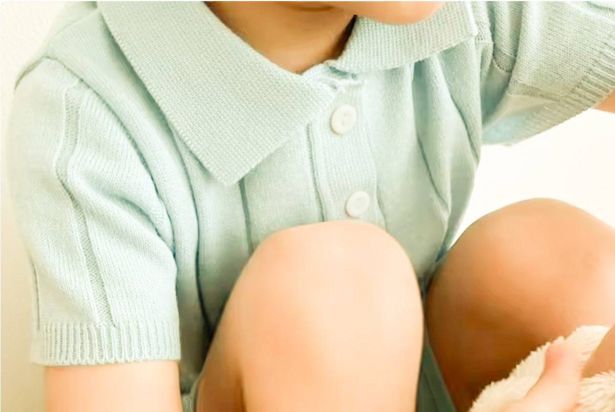 Dress your little one in this adorable baby sweater polo for a formal look at special occasions.