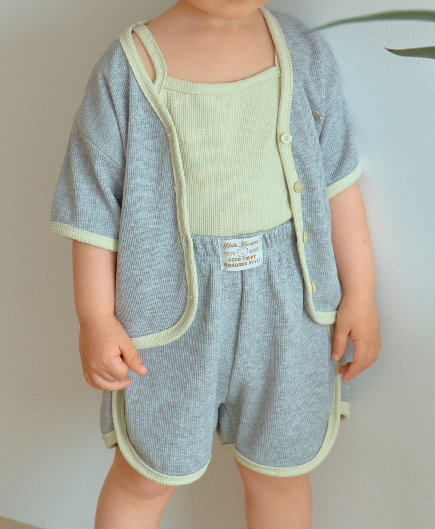 3-piece waffle knit set in neutral tones, representing stylish toddler boy clothes with Korean design