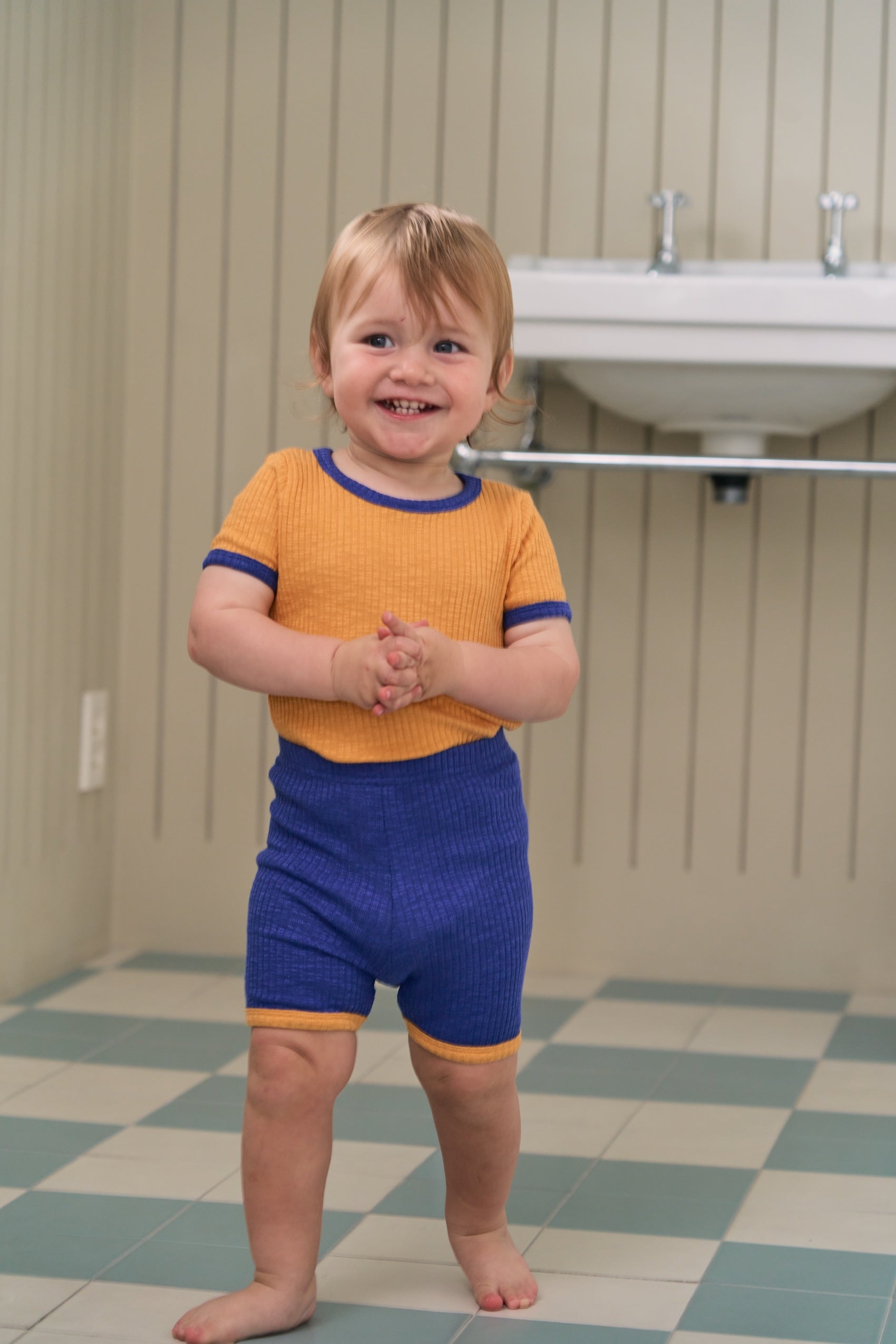 Unique baby clothes in cotton-rich fabric, perfect for active play and relaxing indoors