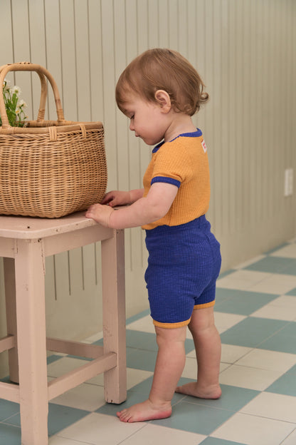 Unique baby clothes in soft fabric, perfect for active play and relaxing indoors