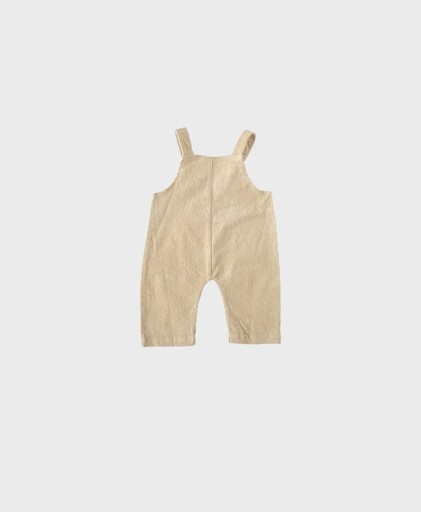 Beige baby corduroy pants with large front pockets, designed for hip baby boy clothing and baby boy dedication clothes
