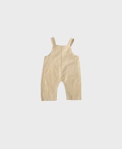 Beige baby corduroy pants with large front pockets, designed for hip baby boy clothing and baby boy dedication clothes