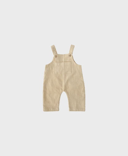 Beige baby corduroy pants featuring spacious front pockets for baby boy dedication clothes