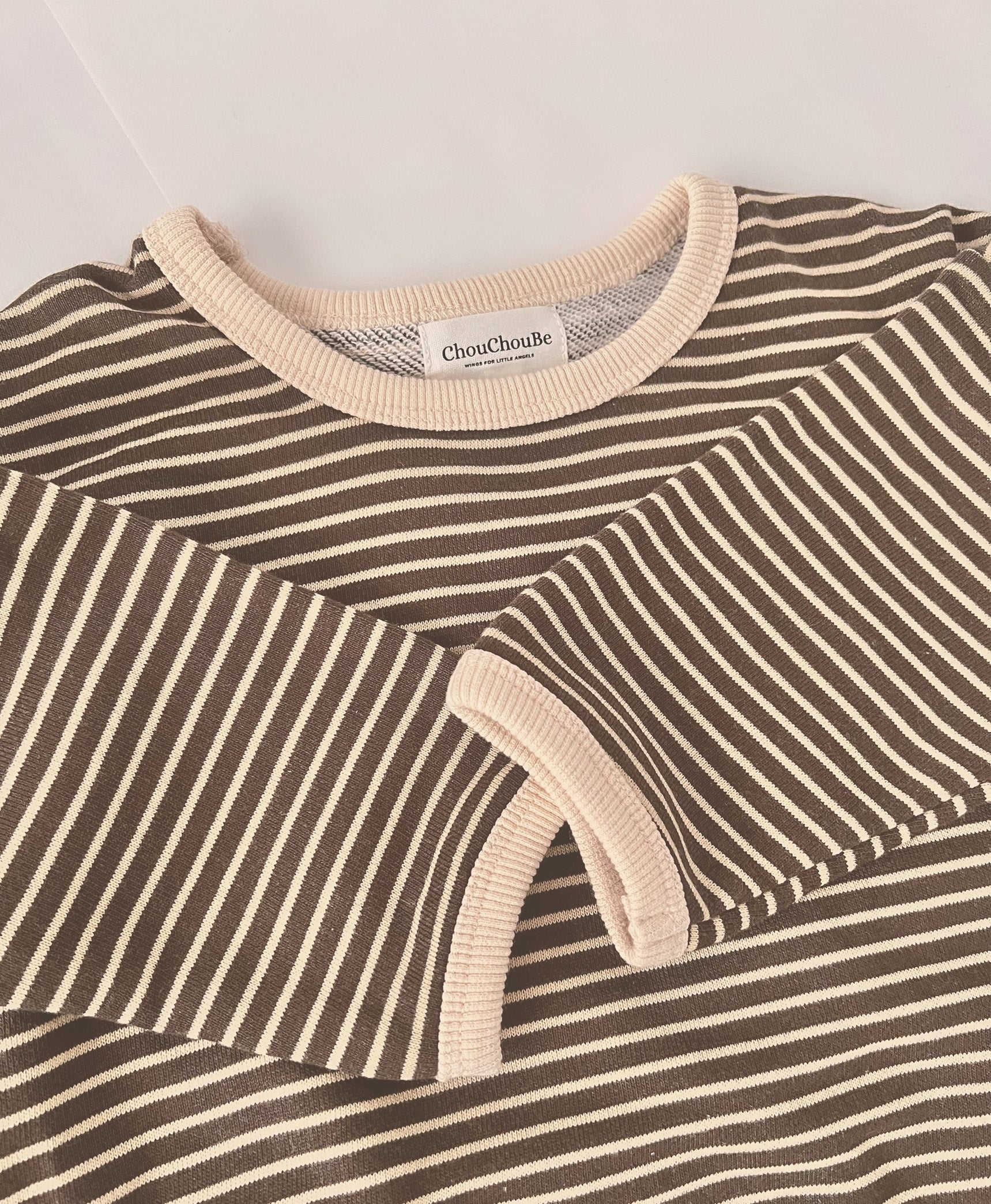 Brown loose-fitting baby sweatshirt with a delightful striped pattern, designed for baby christening outfit boy and baby boy boutique clothing