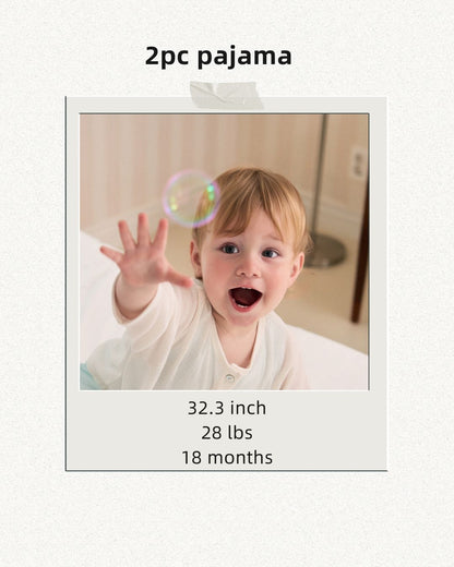 Mom and toddler son wearing matching comfy pajamas in cool colors sizing info
