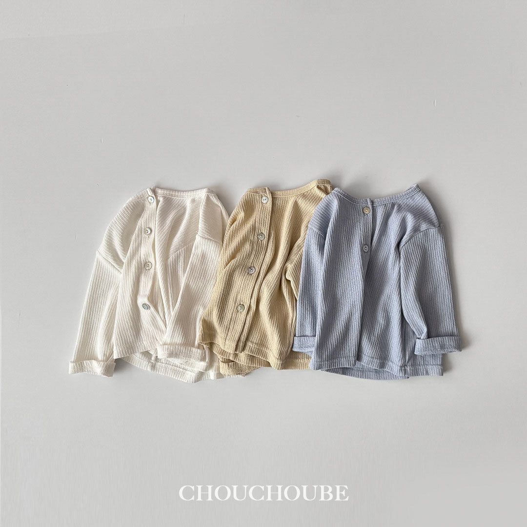 Three children's shirts in white, beige, and blue on a gray background with 'CHOUCHOUBE' branding.
