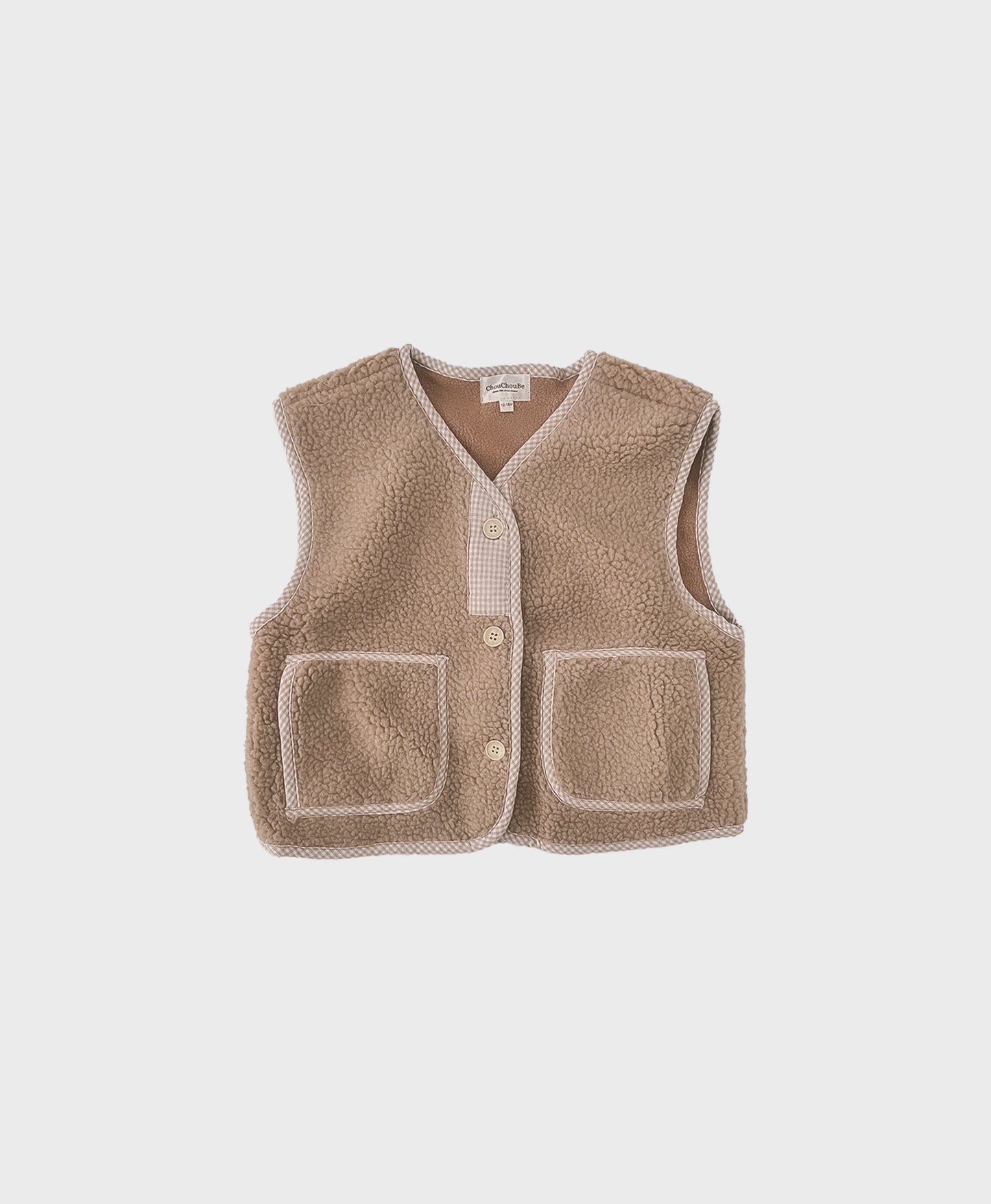 Brown soft fleece baby vest featuring front pockets, designed for comfort and style in a sleeveless design for baby boy dedication clothes