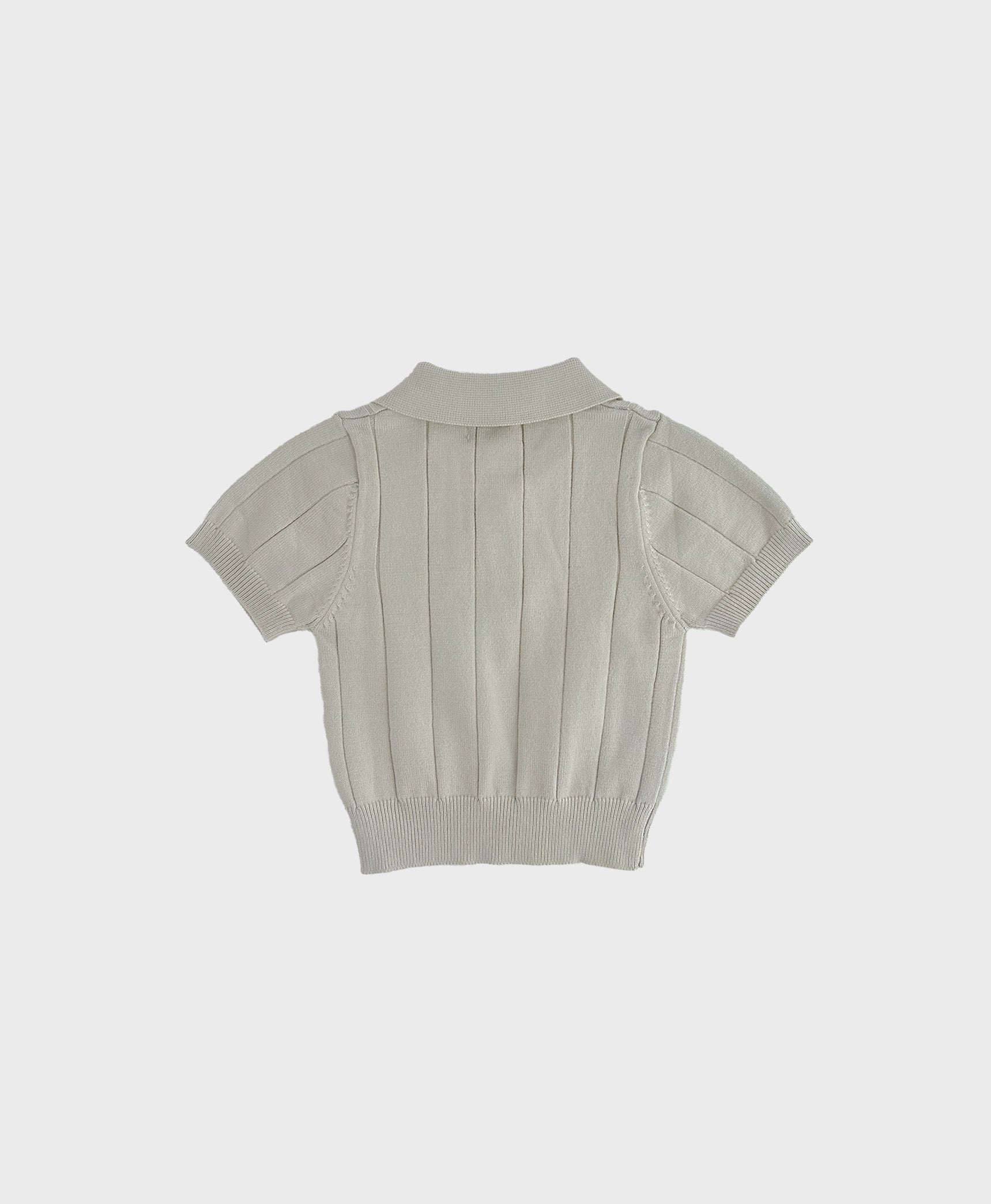 A soft knit grey polo shirt with a collar, perfect for formal occasions. Ideal for baby boy dedication clothes.