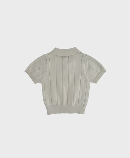 A soft knit grey polo shirt with a collar, perfect for formal occasions. Ideal for baby boy dedication clothes.