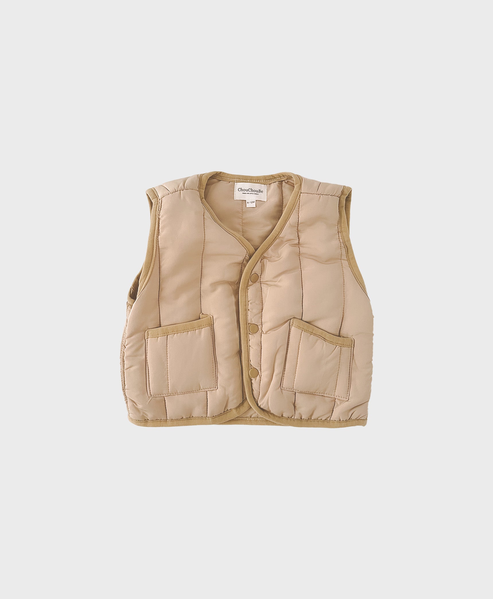 Beige baby windproof quilted puffer vest featuring front pockets for baby boy boutique clothing